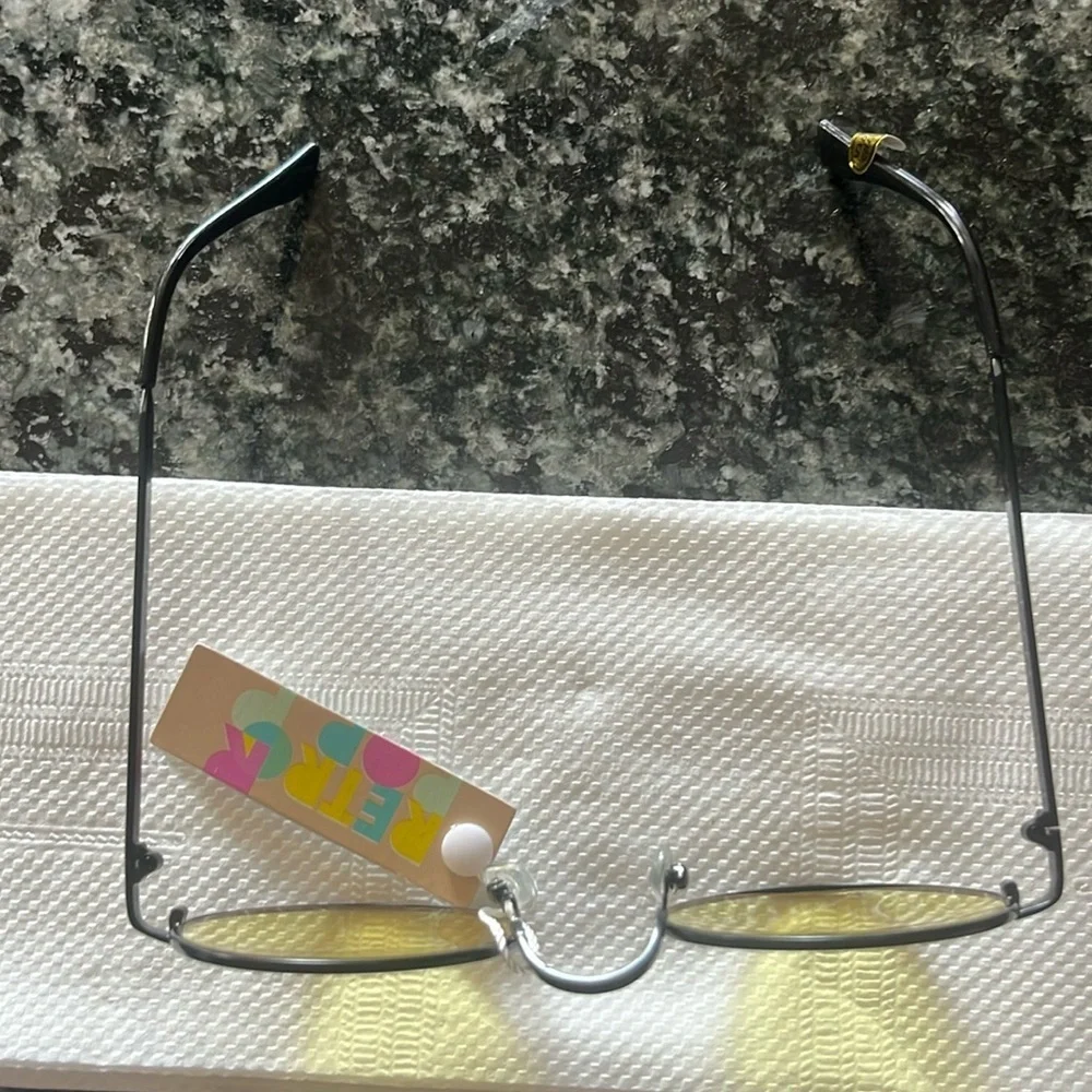 Round Yellow Lens with Silver Frame Sunglasses.